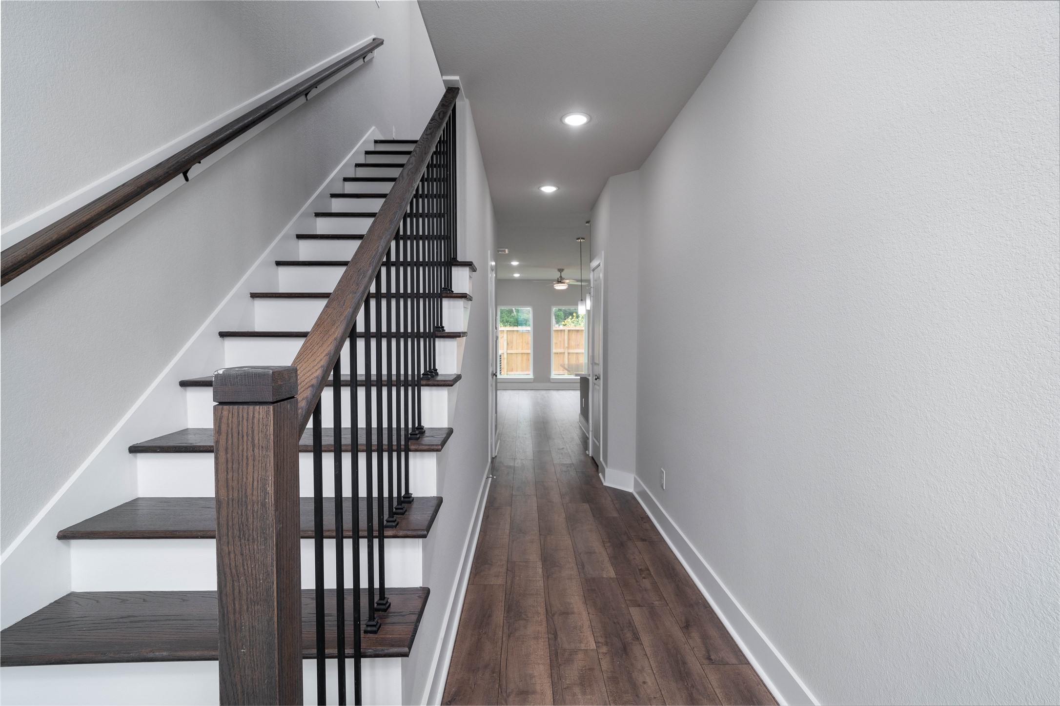 4401 Alvin Street, Unit A Houston, TX 77051 - Photo 4 of 12 Upgraded wooden stairs add a flair of elegance to your new home