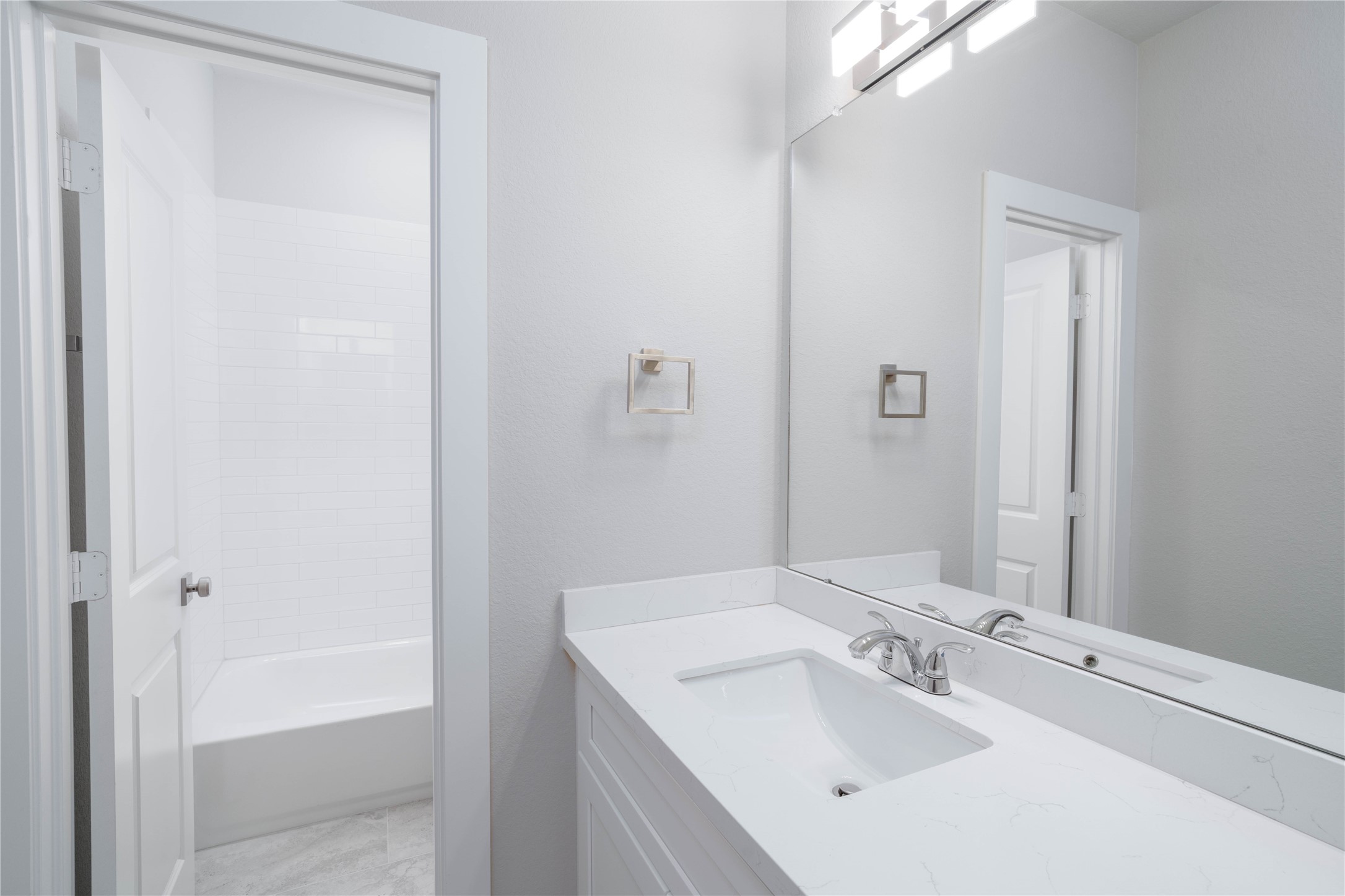4401 Alvin Street, Unit A Houston, TX 77051 - Photo 5 of 12 A view of the upstairs secondary bathroom w/ privacy door to allow for sink accessibility during use.