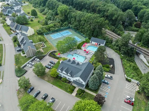 an aerial view of house with yard