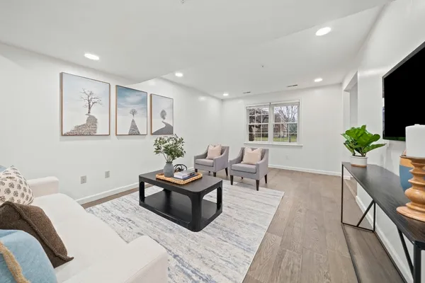 a bedroom with furniture and a bed