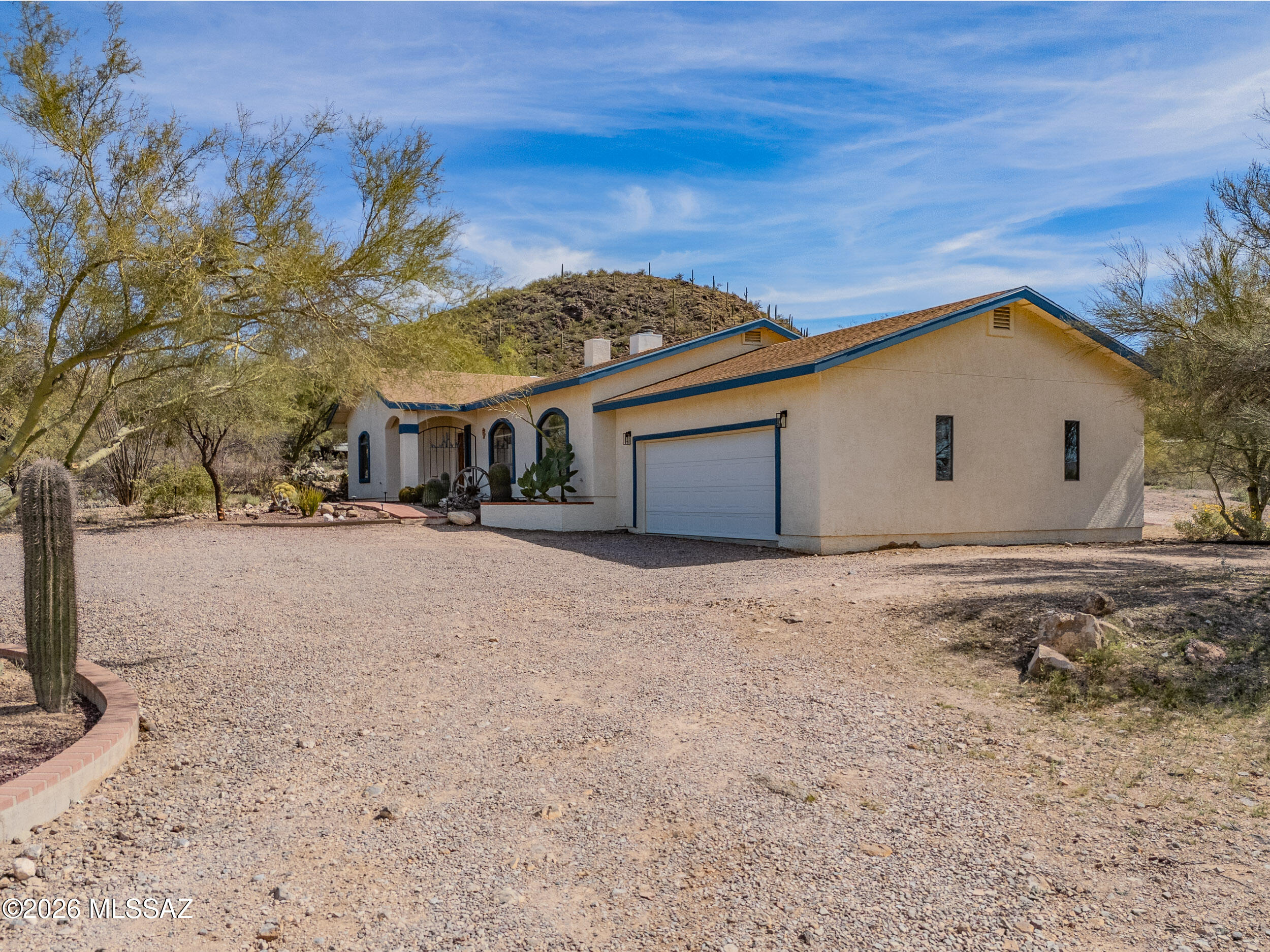 4155 West Coyote Ridge Trail Tucson, AZ 85746 - Photo 3 of 39 a view of a house with a snow