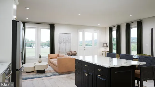 a large bathroom with double vanity and a large mirror