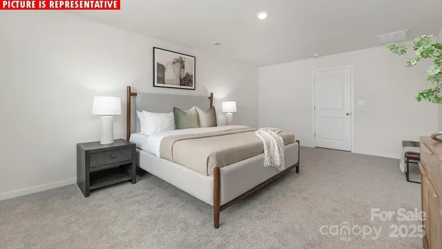 a bed room with a bed and a couch