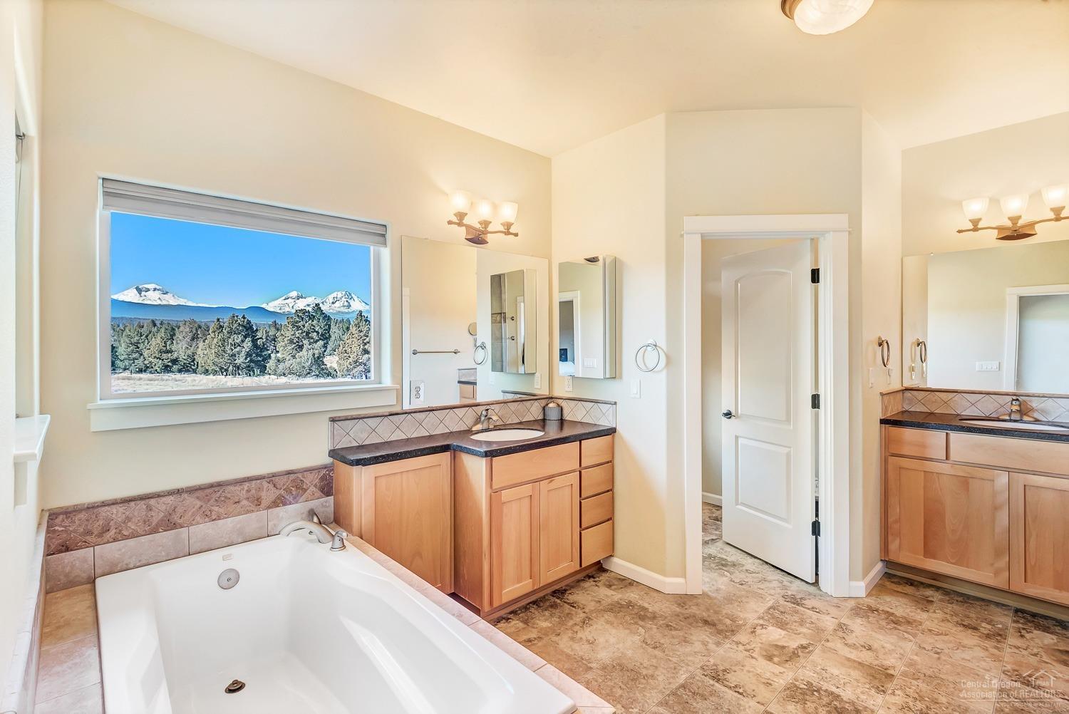 18865 Couch Market Road Bend, OR 97703 - Photo 10 of 25 Generously sized master bath with views