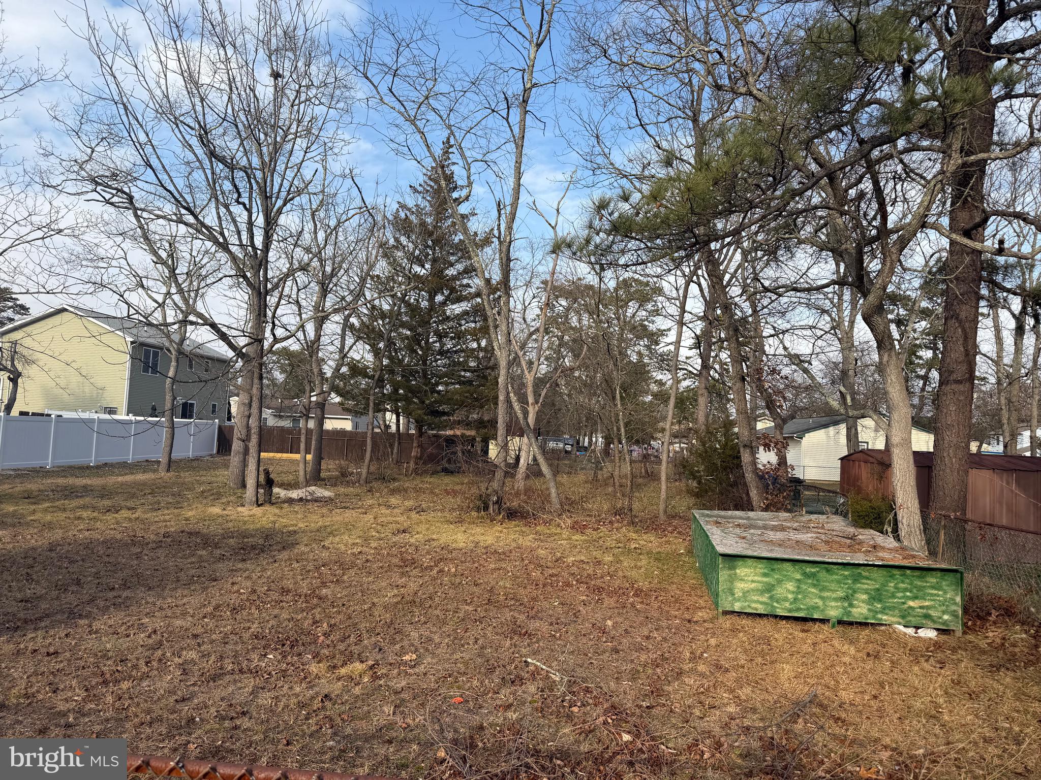 0 Red Feather Trail Germantown, MD 20874 - Photo 3 of 3 a backyard of apartments with large trees