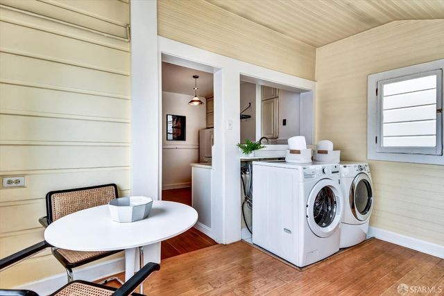 a utility room with dryer and washer
