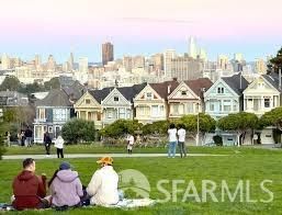 a front view of a house with a yard table and chairs
