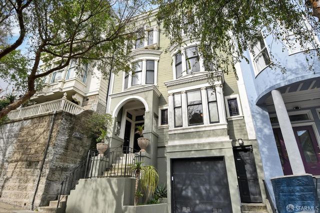 a front view of a building with glass windows