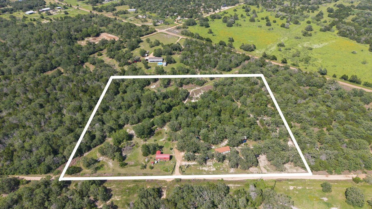 1705 Makinson Road West Point, TX 78963 - Photo 32 of 40 A vast, wooded lot provides privacy and natural beauty, ideal for tranquil living.