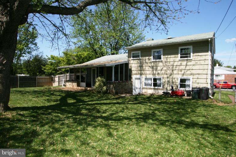 1001 Hartmont Road Catonsville, MD 21228 - Photo 1 of 29 a view of a house with a yard
