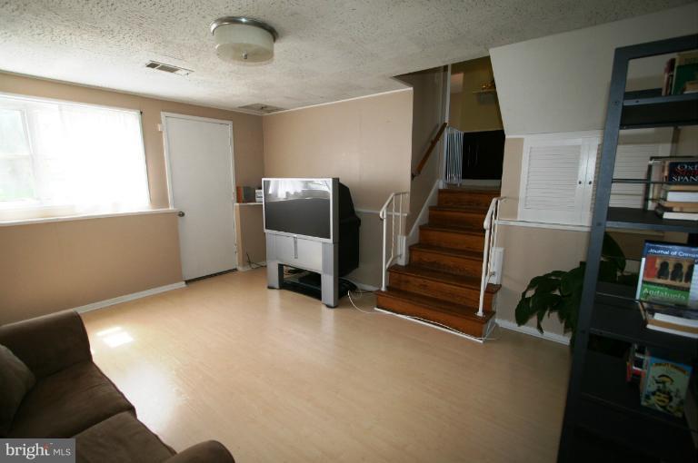 1001 Hartmont Road Catonsville, MD 21228 - Photo 12 of 29 a view of a livingroom with furniture and staircase