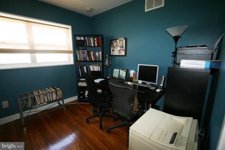 1001 Hartmont Road Catonsville, MD 21228 - Photo 22 of 29 a view of a workspace with furniture and a window