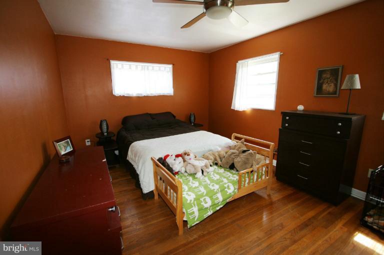 1001 Hartmont Road Catonsville, MD 21228 - Photo 10 of 29 a bedroom with a bed and window