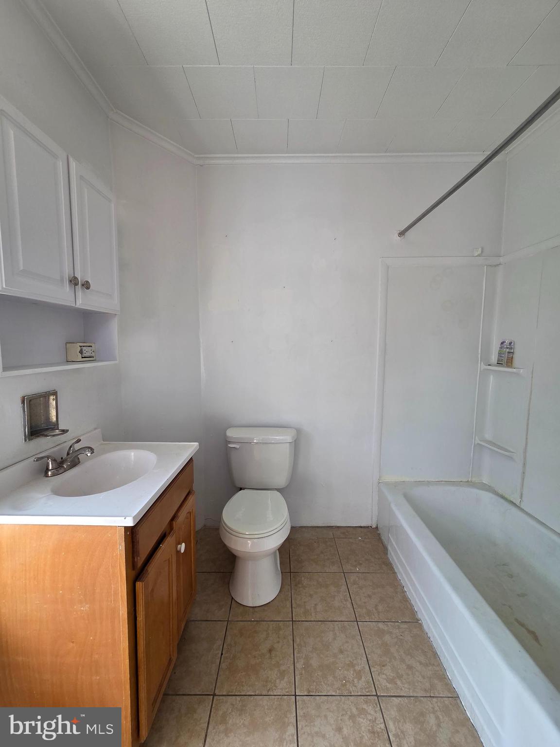 1712 Perkiomen Avenue Reading, PA 19602 - Photo 13 of 20 a bathroom with a sink toilet and vanity