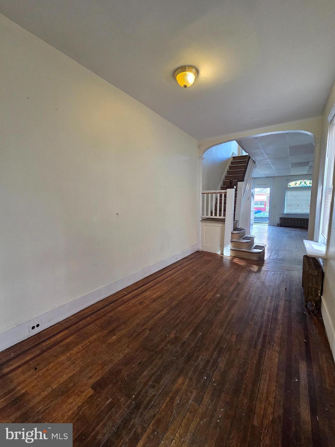 1712 Perkiomen Avenue Reading, PA 19602 - Photo 4 of 20 a view of empty room with wooden floor