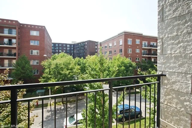 a view of a brick building from a balcony