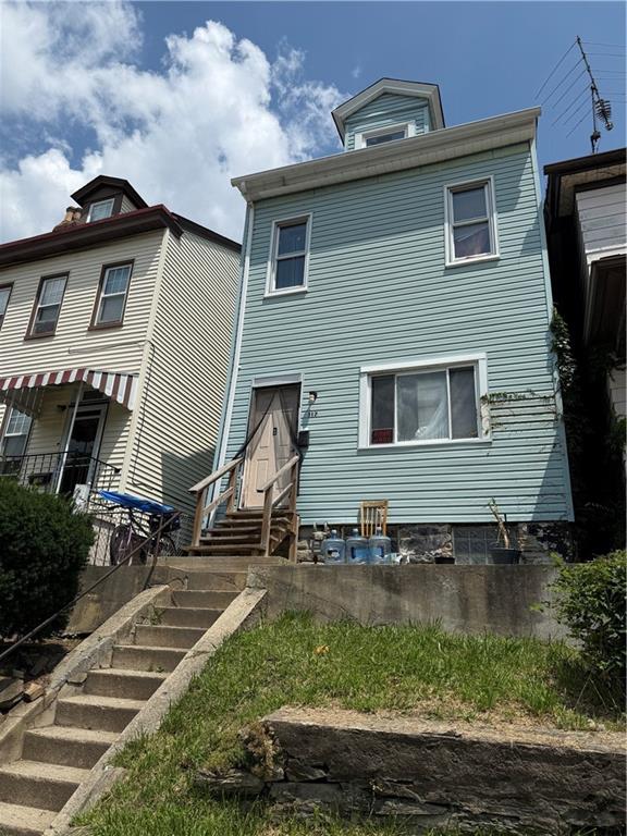 117 Charles Street Pittsburgh, PA 15210 - Photo 2 of 17 a view of house with yard