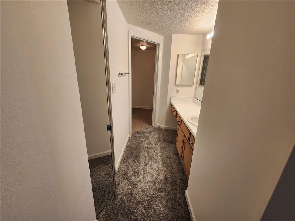 199 14th Street Northeast, Unit 209 Atlanta, GA 30309 - Photo 8 of 13 a view of hallway with wooden floor