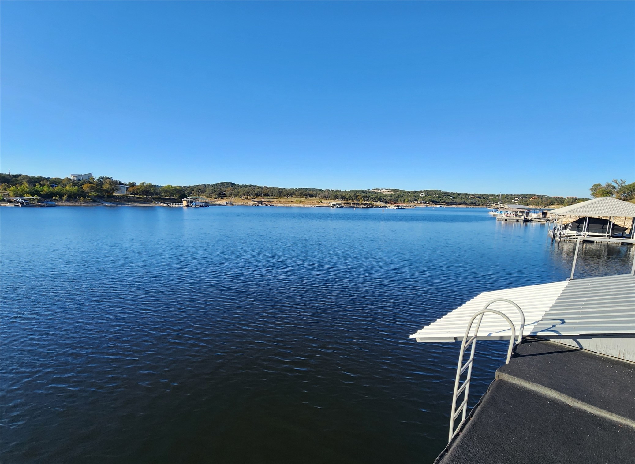 19645 Lakehurst Loop Spicewood, TX 78669 - Photo 12 of 40 Dock with a water view