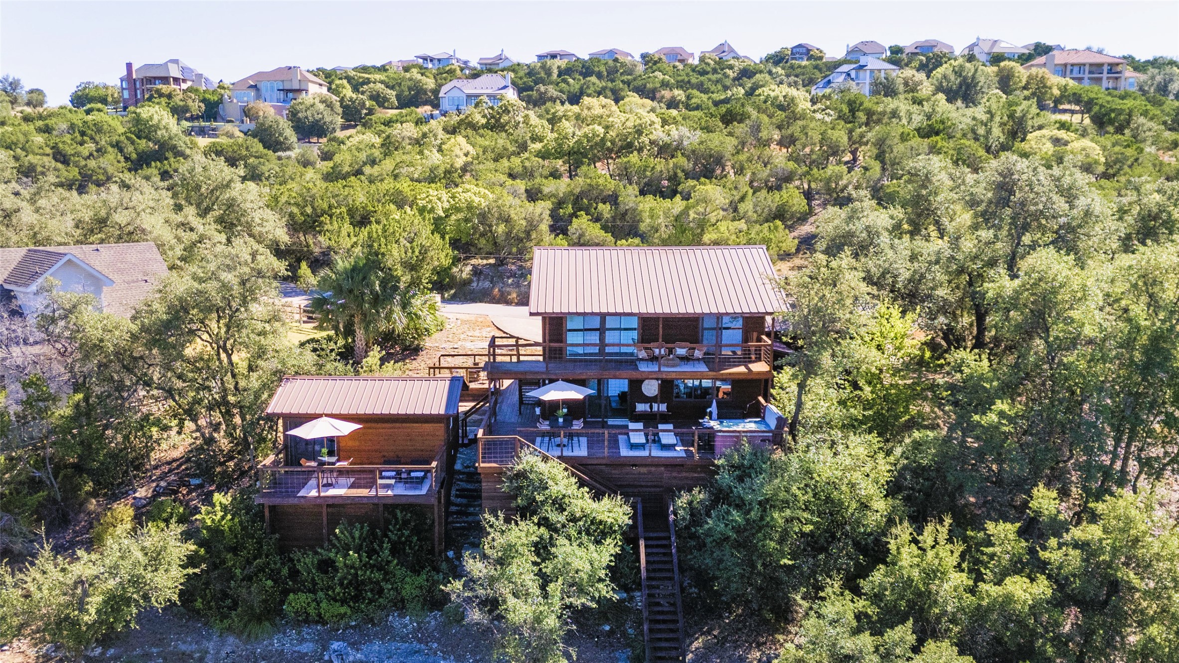 19645 Lakehurst Loop Spicewood, TX 78669 - Photo 6 of 40 Bird's eye view of the rear elevation