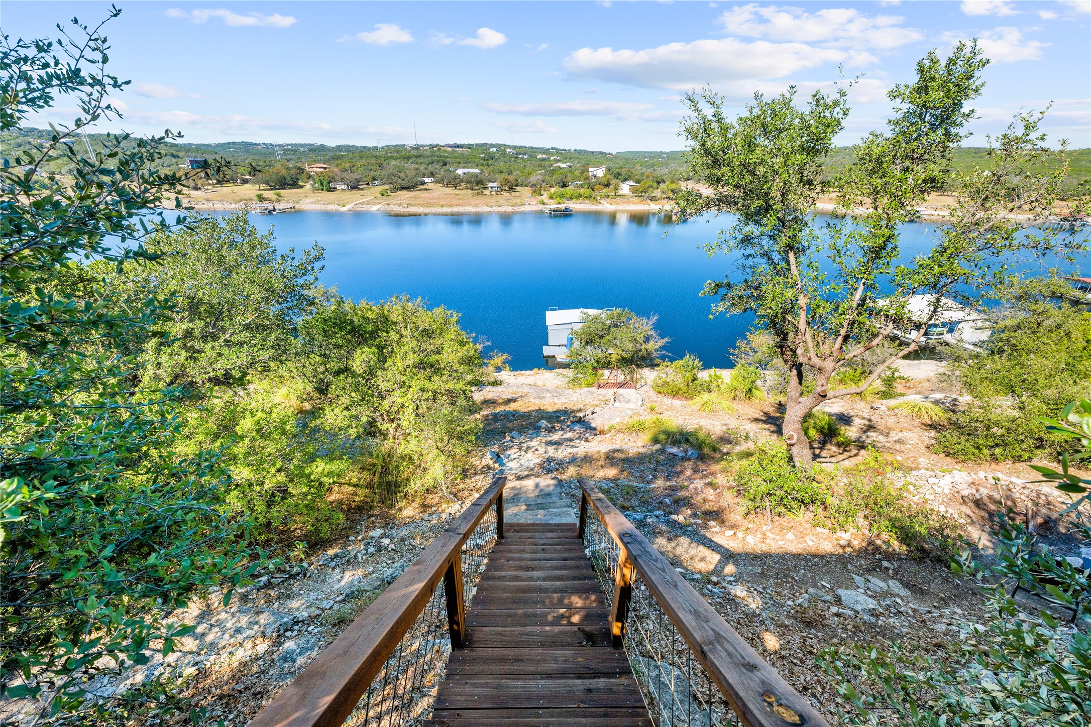 19645 Lakehurst Loop Spicewood, TX 78669 - Photo 7 of 40 Stairs to lake and dock