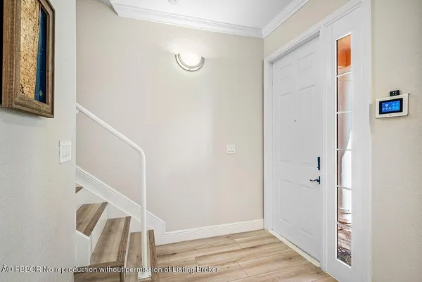 a view of an entryway with staircase