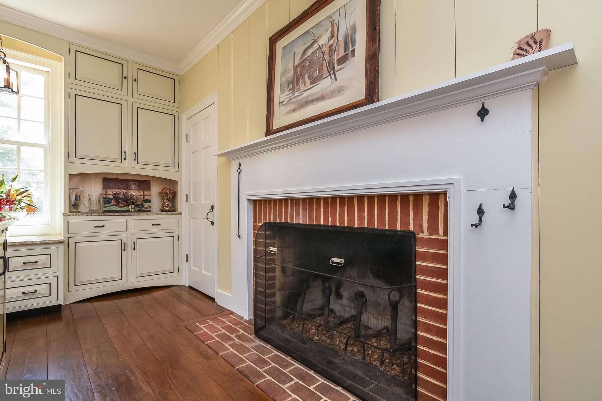 18051 Stoney Point Road King George, VA 22485 - Photo 11 of 52 Fireplace in the kitchen
