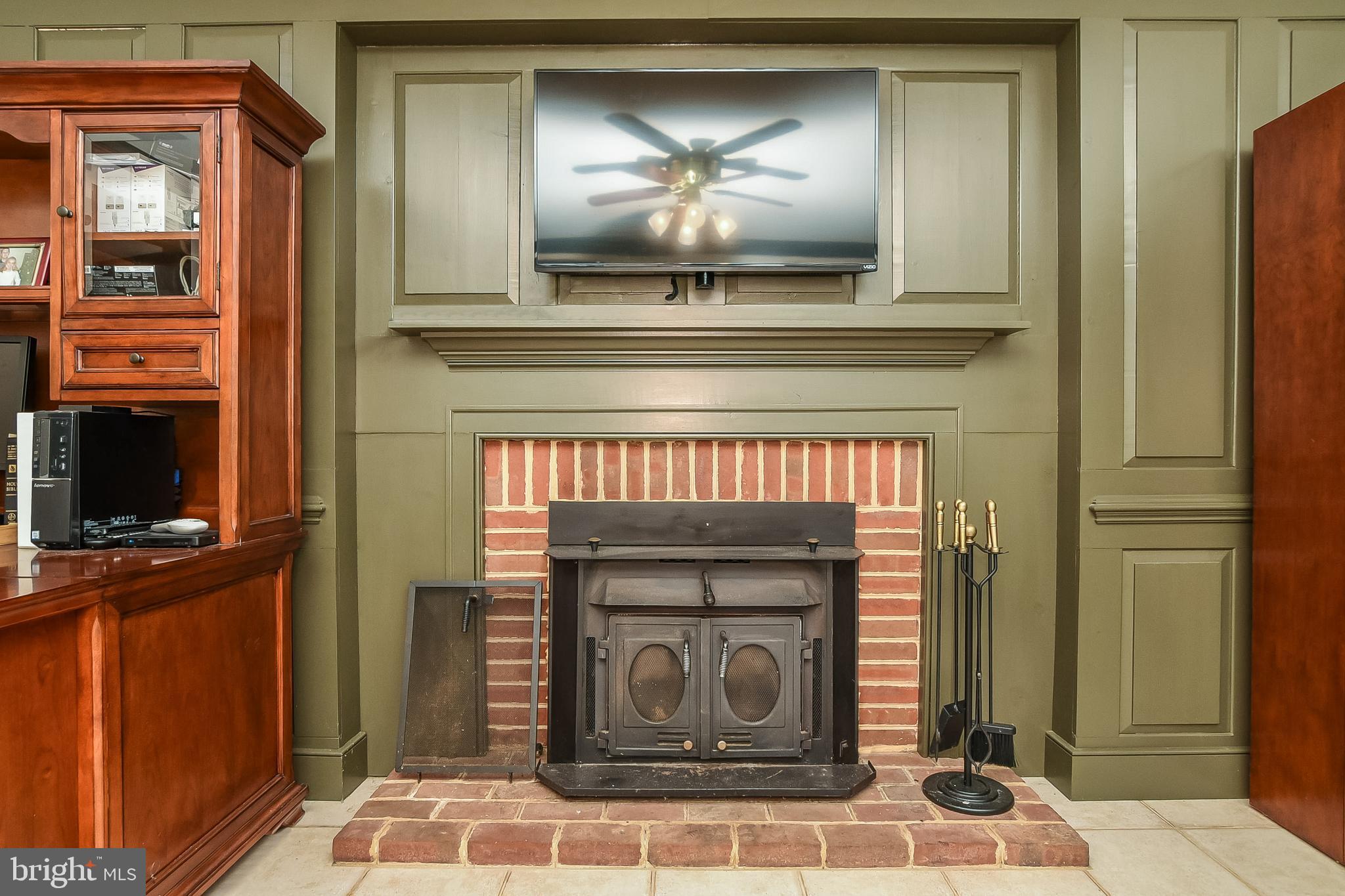 18051 Stoney Point Road King George, VA 22485 - Photo 41 of 52 Fireplace in the basement family room