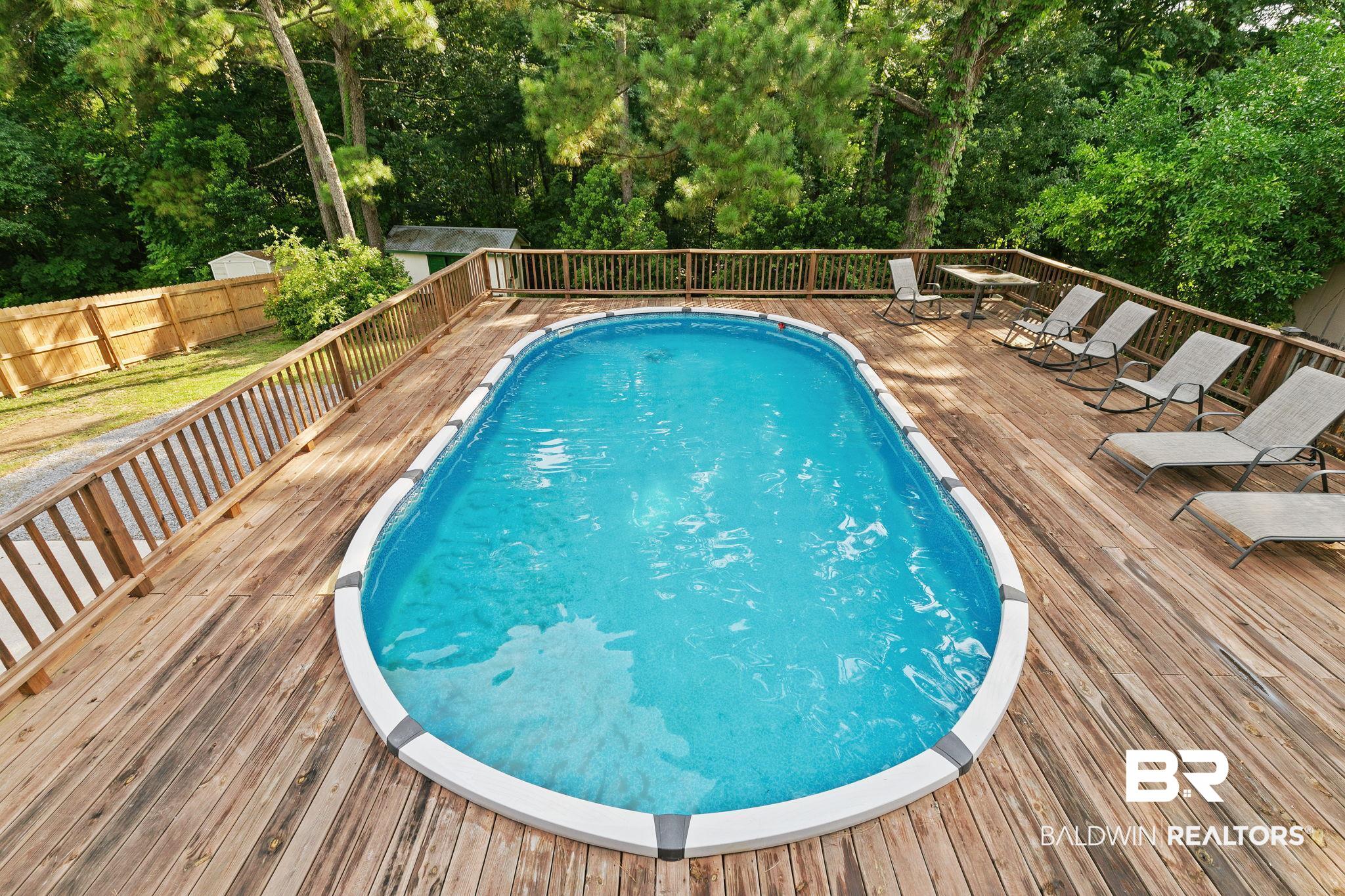 14 Lee Circle Daphne, AL 36527 - Photo 61 of 83 View of pool with a wooden deck