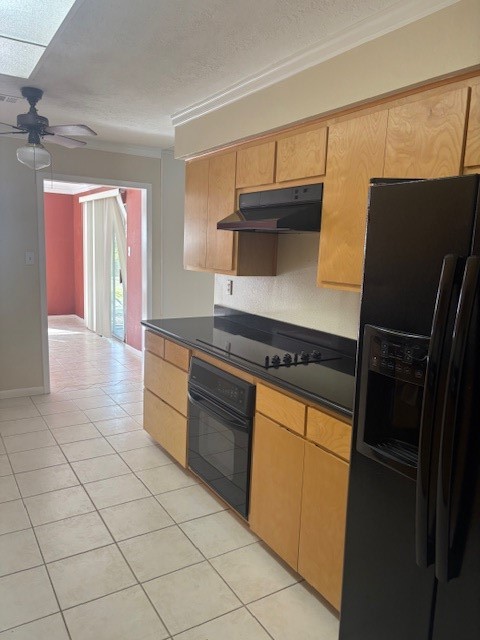 2023 Westlake Road Houston, TX 77062 - Photo 6 of 18 a kitchen with granite countertop a refrigerator and a stove top oven