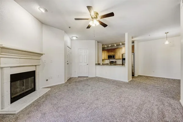 a view of a kitchen with a sink