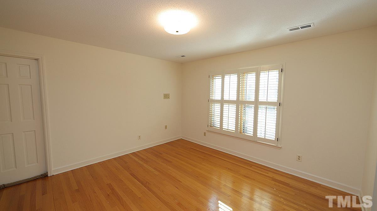 9005 Oneal Road Raleigh, NC 27613 - Photo 20 of 24 an empty room with a window