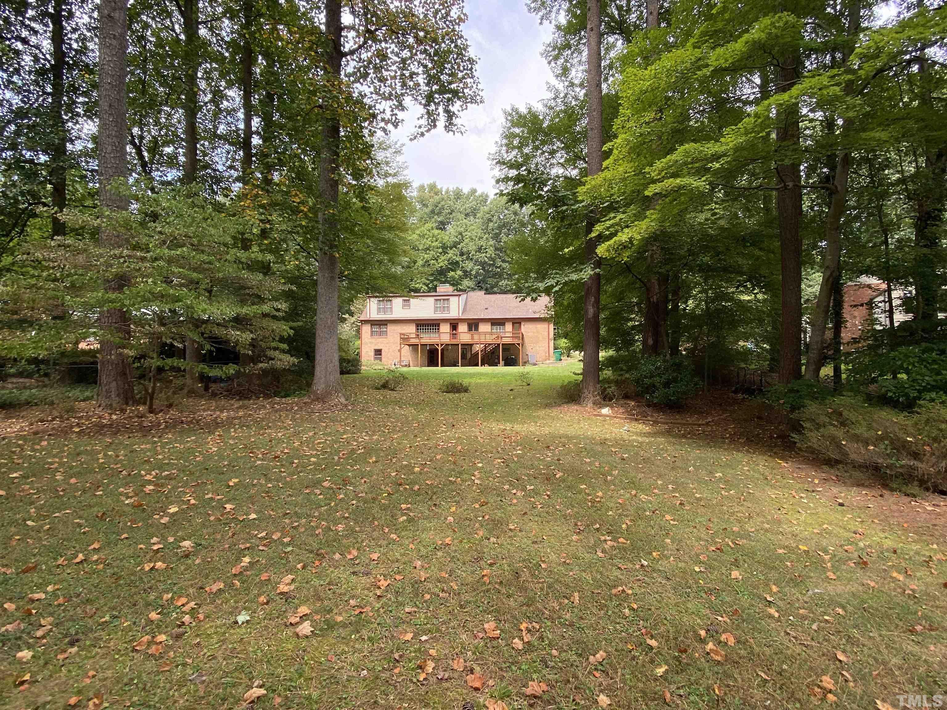 9005 Oneal Road Raleigh, NC 27613 - Photo 4 of 24 a view of a house with a yard