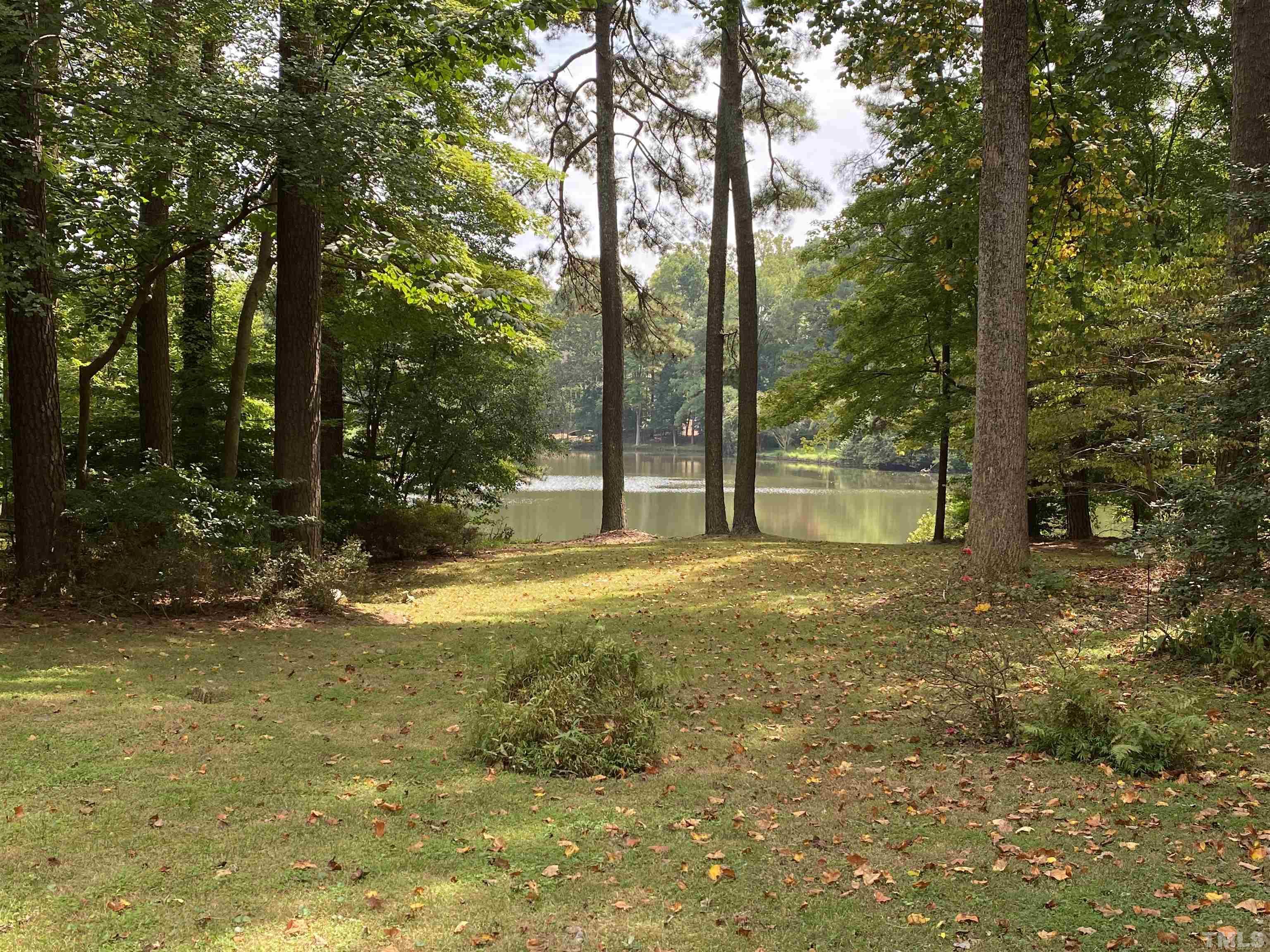 9005 Oneal Road Raleigh, NC 27613 - Photo 7 of 24 a view of a yard with trees