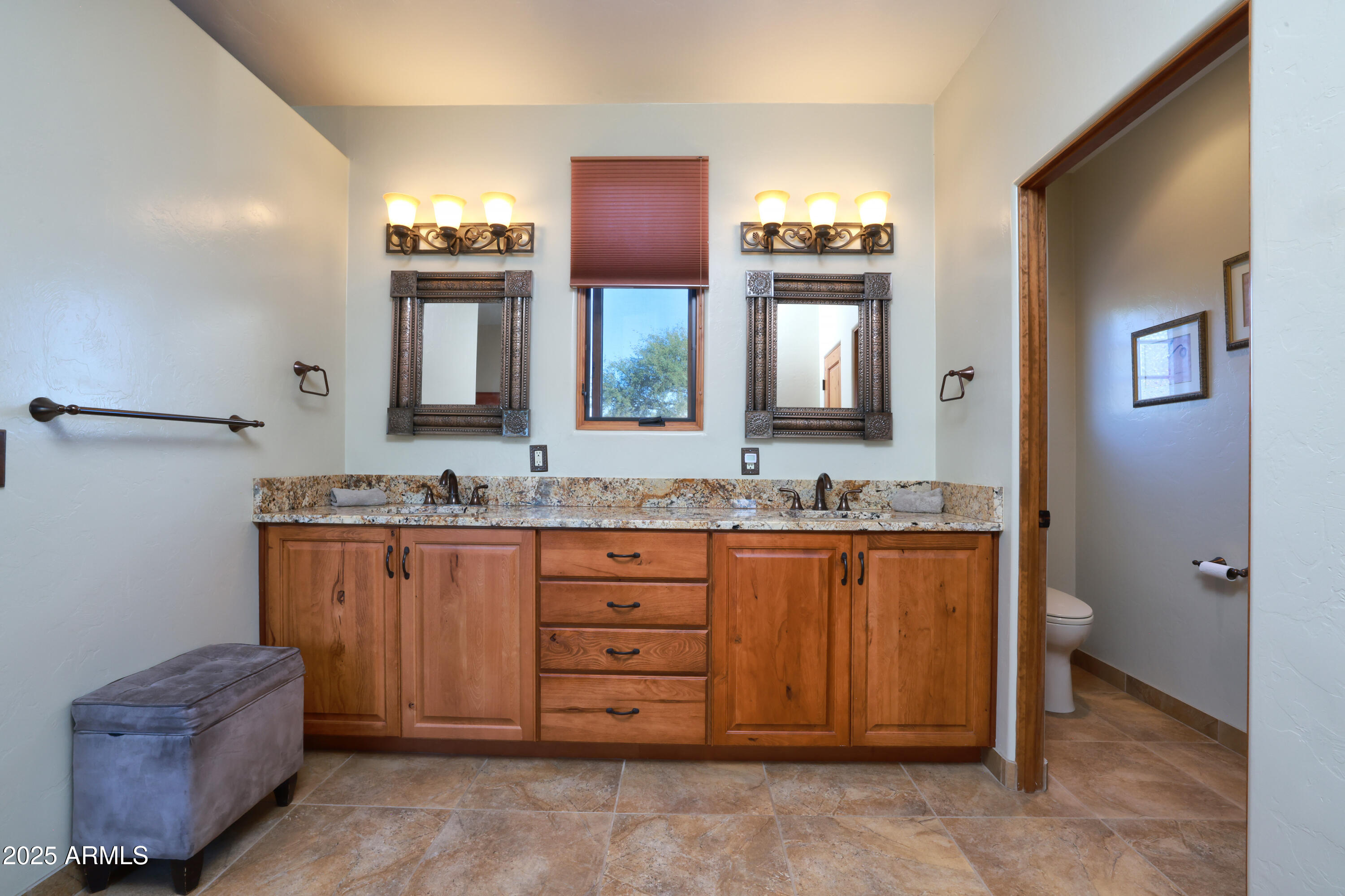 12800 West Arivaca Road Amado, AZ 85645 - Photo 22 of 48 a bathroom with a granite countertop sink and a mirror