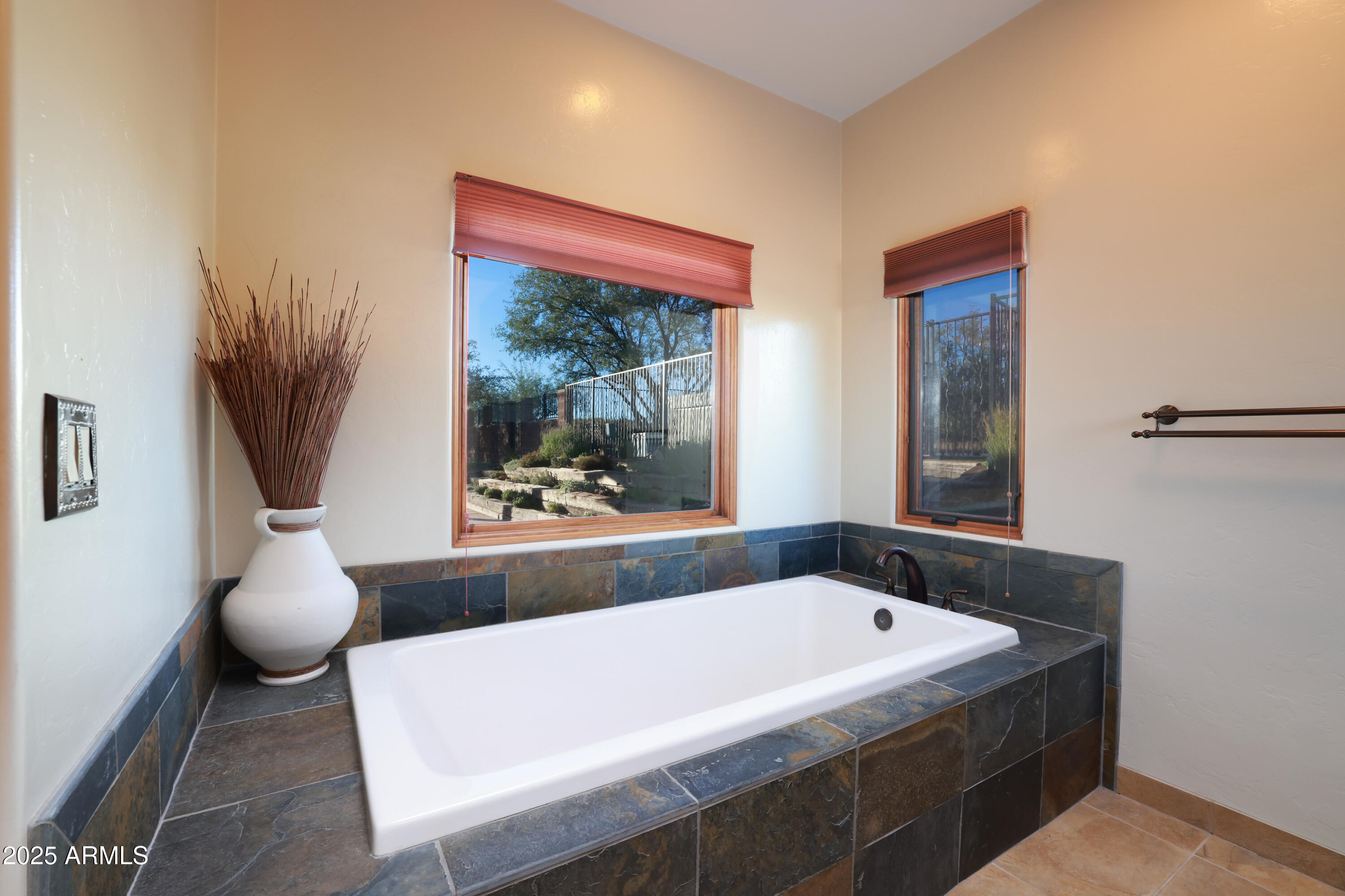 12800 West Arivaca Road Amado, AZ 85645 - Photo 24 of 48 a bath tub sitting next to a window