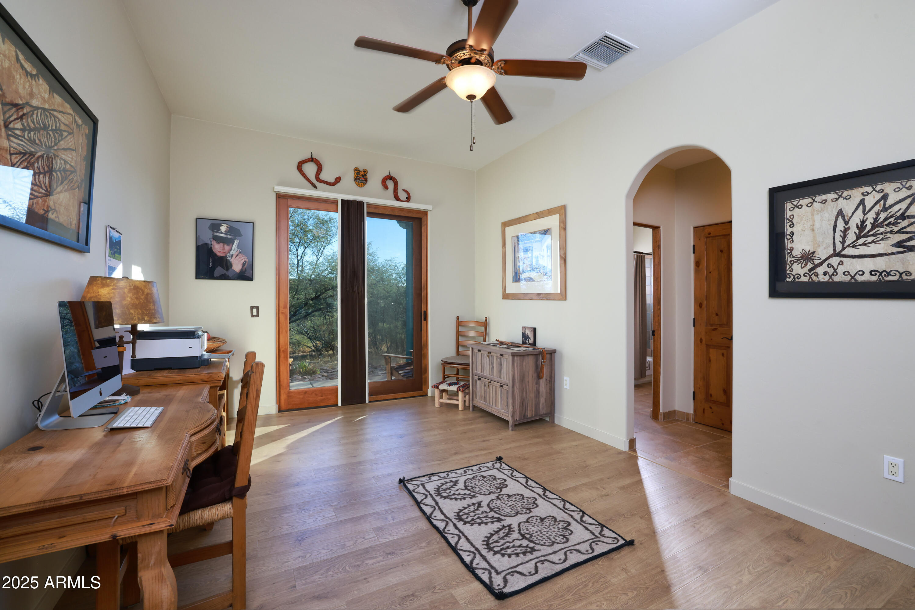 12800 West Arivaca Road Amado, AZ 85645 - Photo 26 of 48 a living room with furniture and a rug