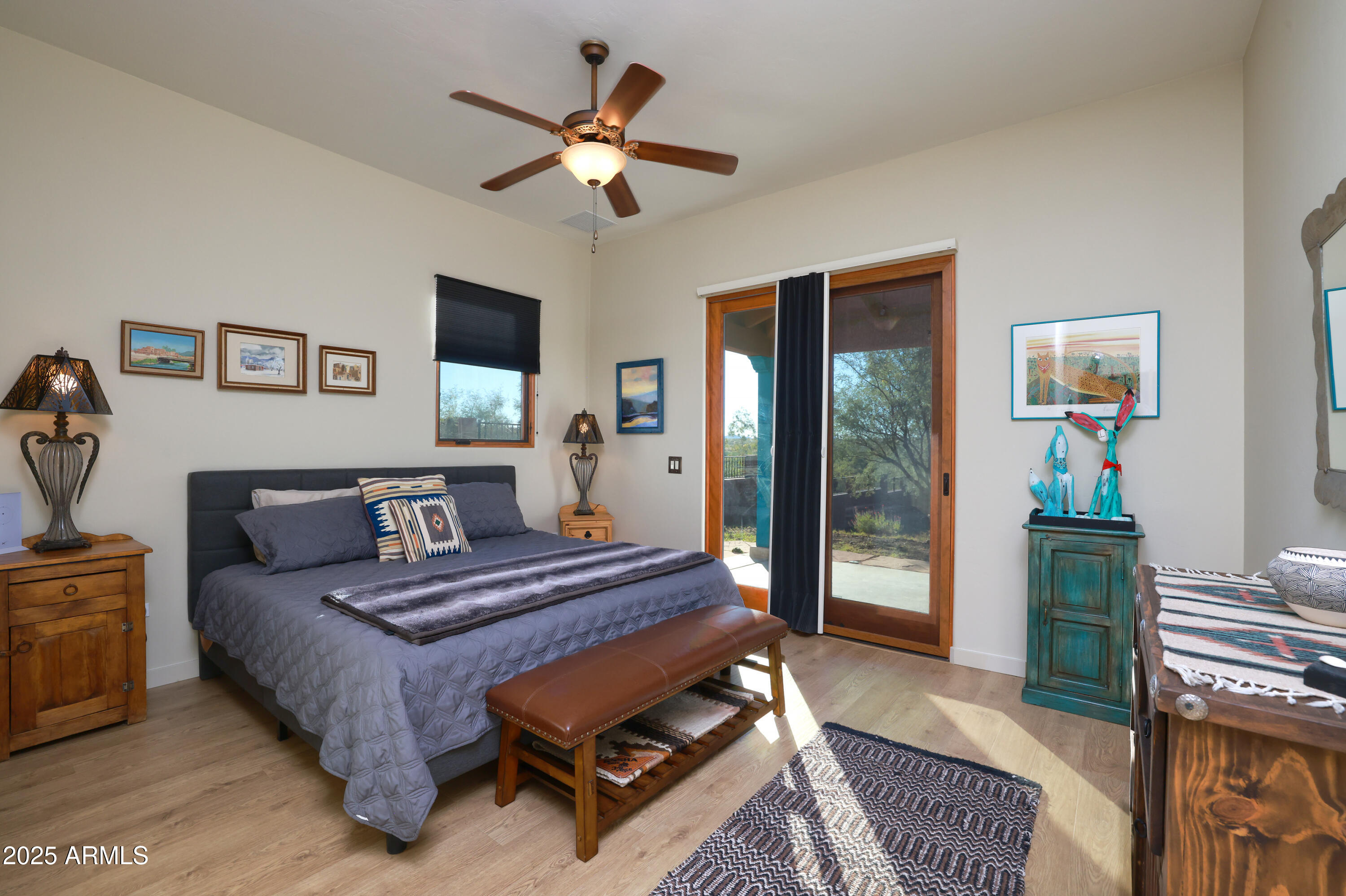 12800 West Arivaca Road Amado, AZ 85645 - Photo 31 of 48 a bedroom with a bed furniture and a window