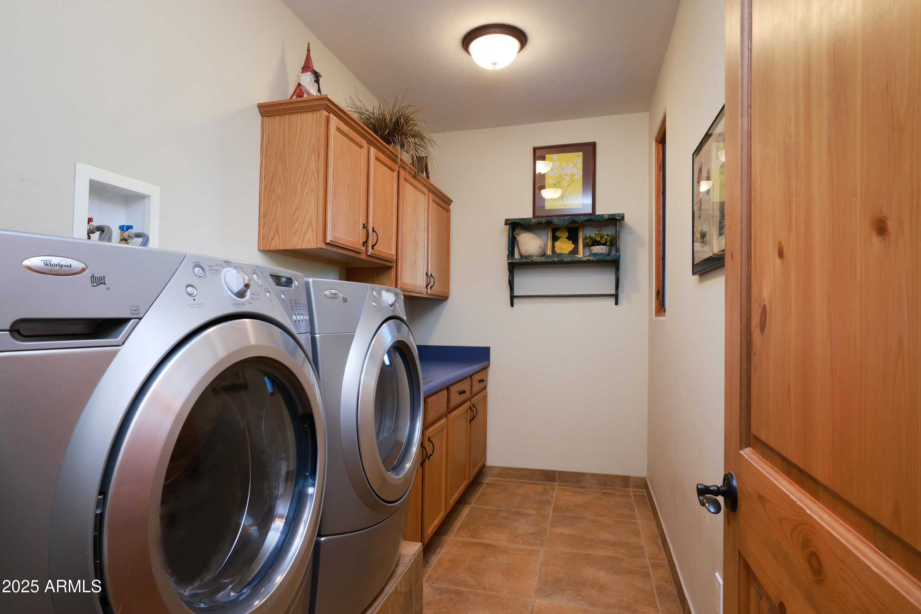 12800 West Arivaca Road Amado, AZ 85645 - Photo 34 of 48 a view of livingroom with washer and dryer