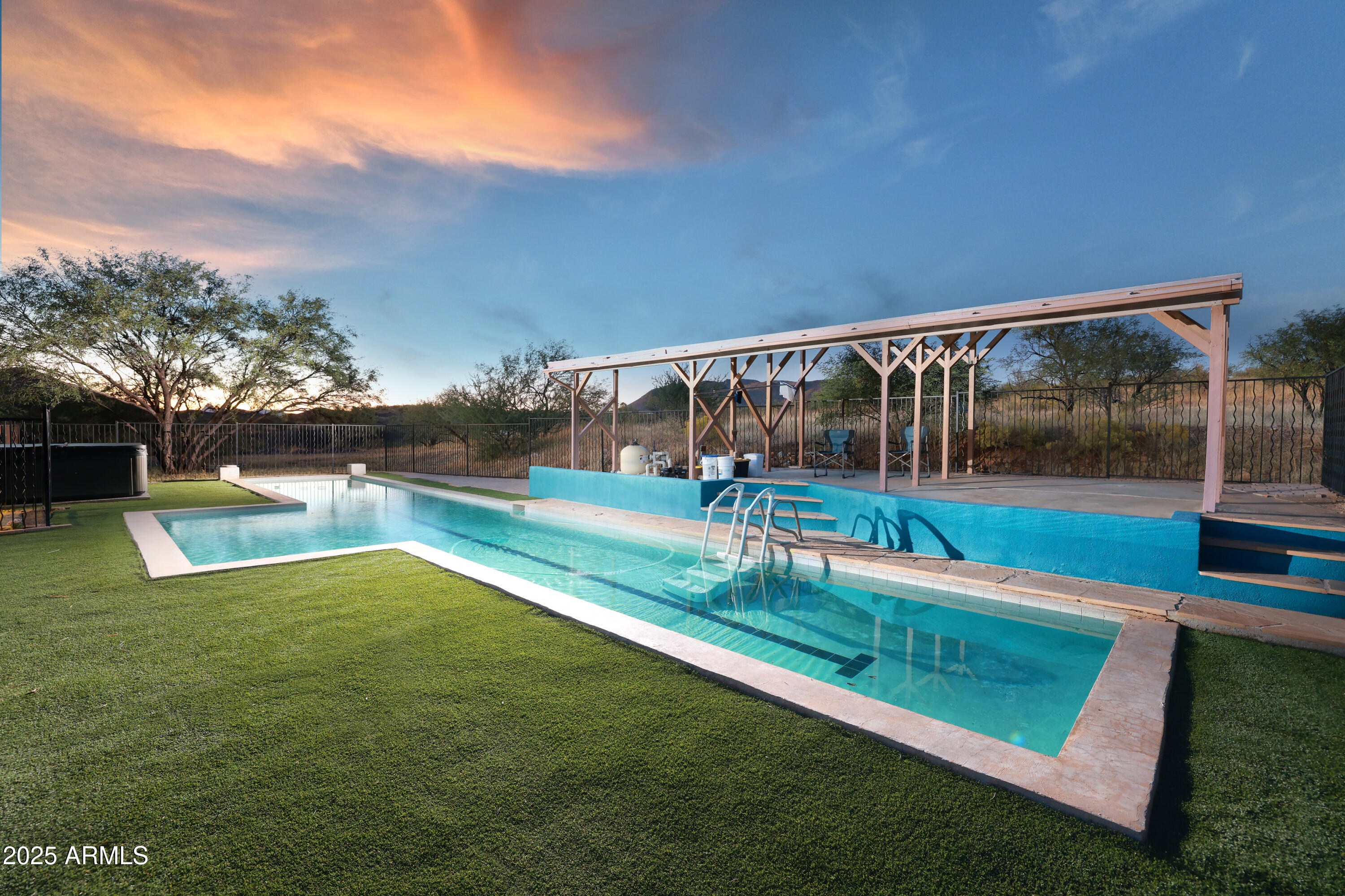 12800 West Arivaca Road Amado, AZ 85645 - Photo 40 of 48 a view of a backyard with swimming pool