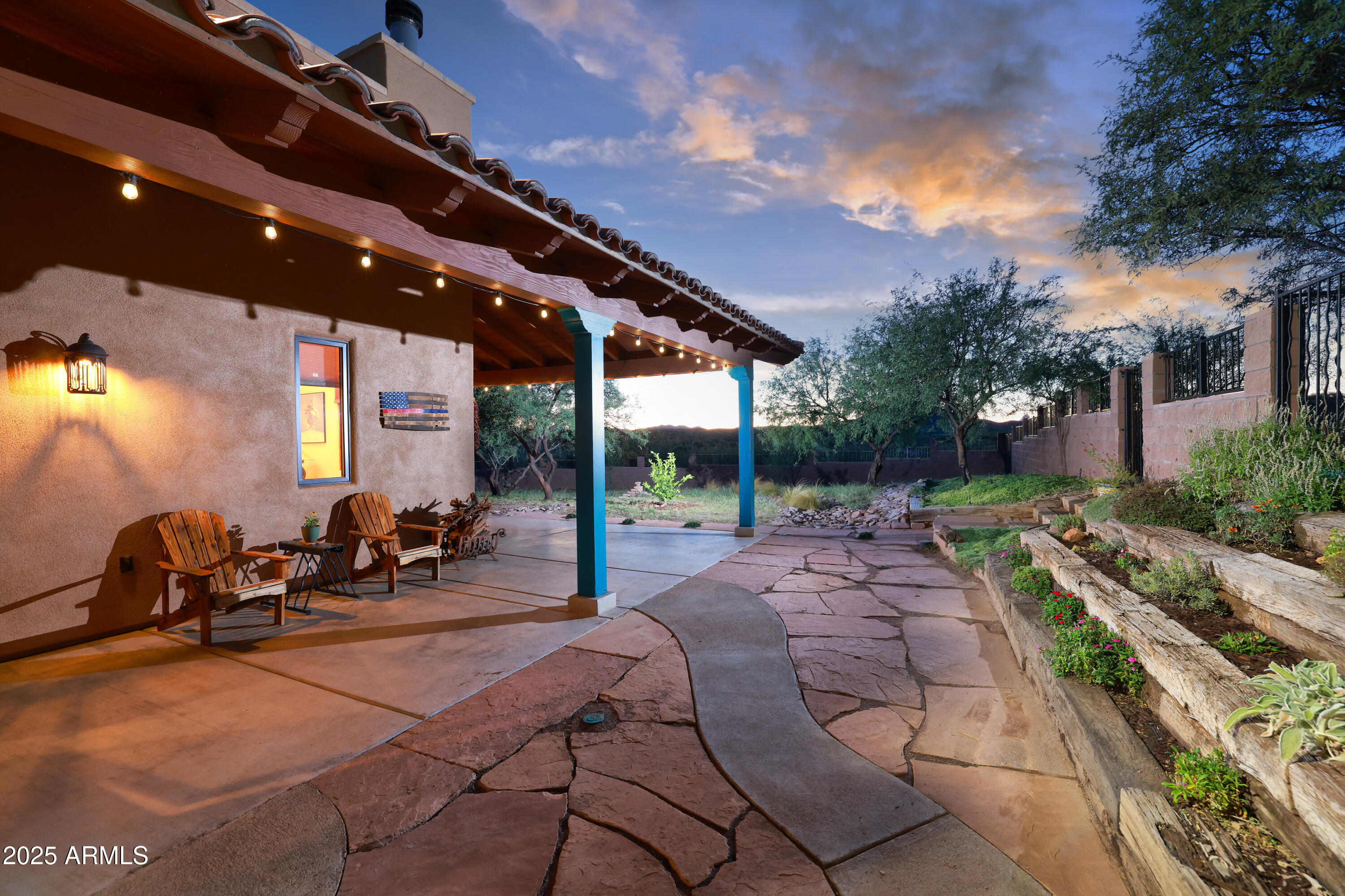 12800 West Arivaca Road Amado, AZ 85645 - Photo 41 of 48 a view of a patio with table and chairs and potted plants