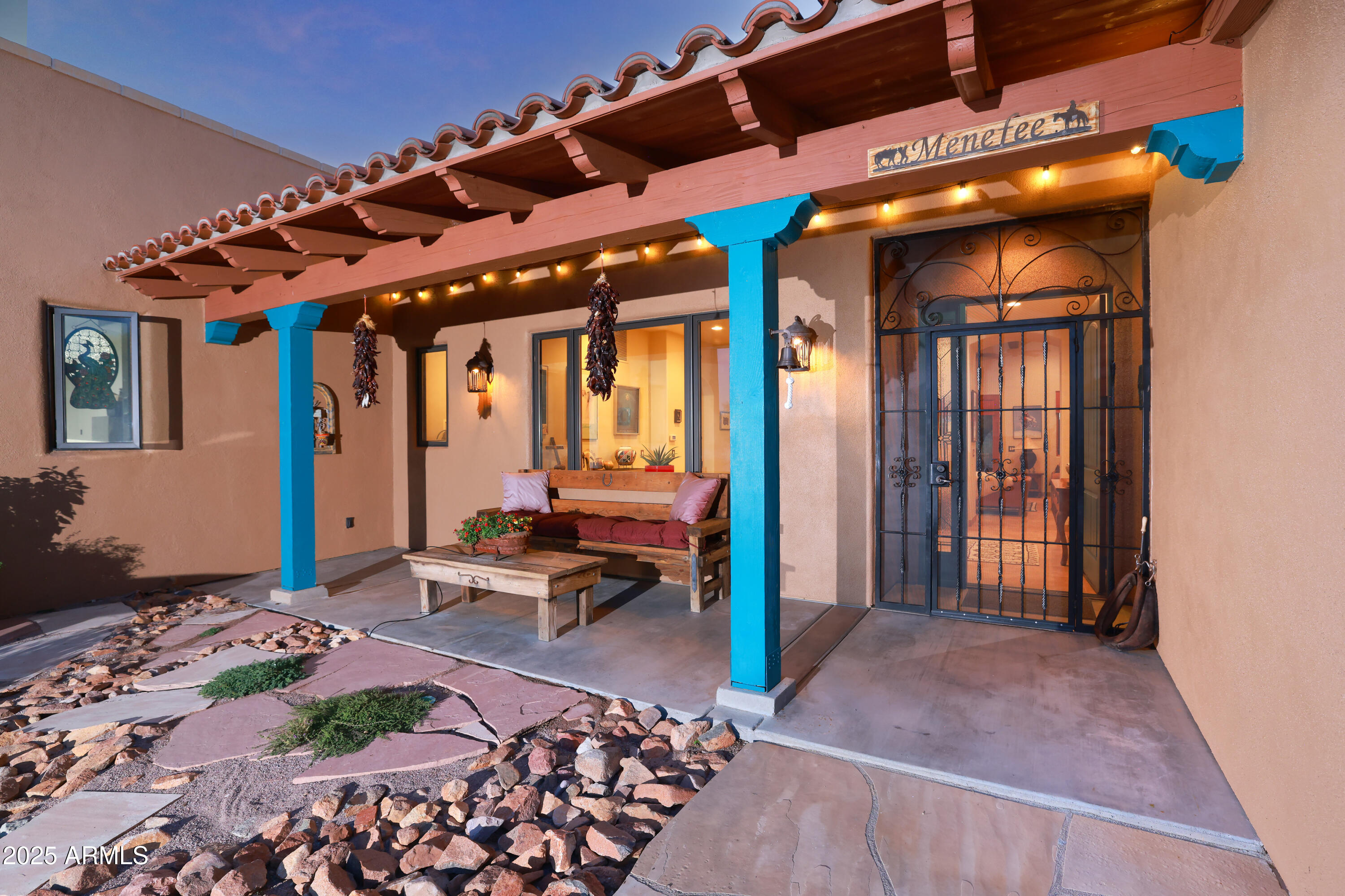 12800 West Arivaca Road Amado, AZ 85645 - Photo 6 of 48 a view of a porch with chairs and backyard