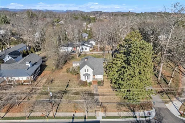 an aerial view of residential house with parking space