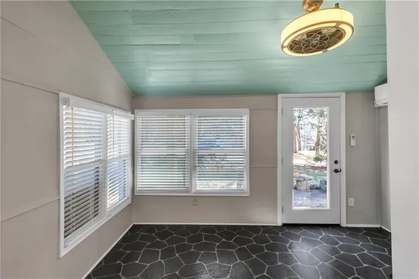 a view of a room with windows