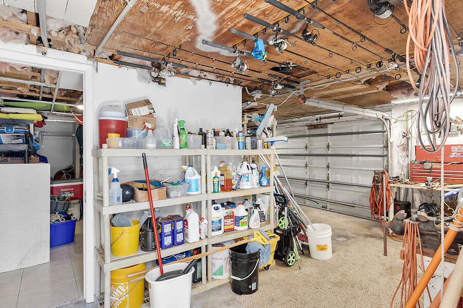 303 Sombrero Beach Road Marathon, FL 33050 - Photo 57 of 84 Side A-garage w/storage shelving