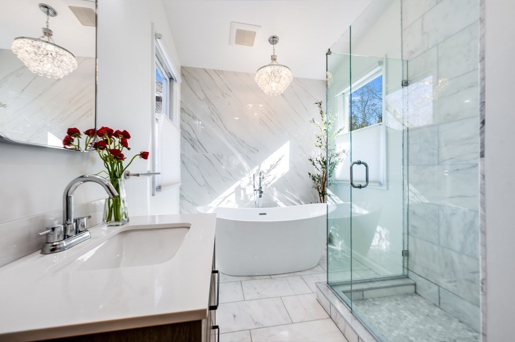 21 Arborough Road Boston, MA 02131 - Photo 22 of 40 a bathroom with a sink and shower