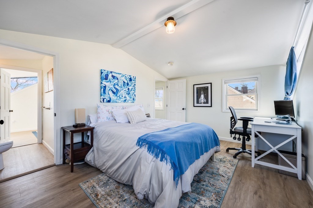 21 Arborough Road Boston, MA 02131 - Photo 25 of 40 a bedroom with a bed and a desk