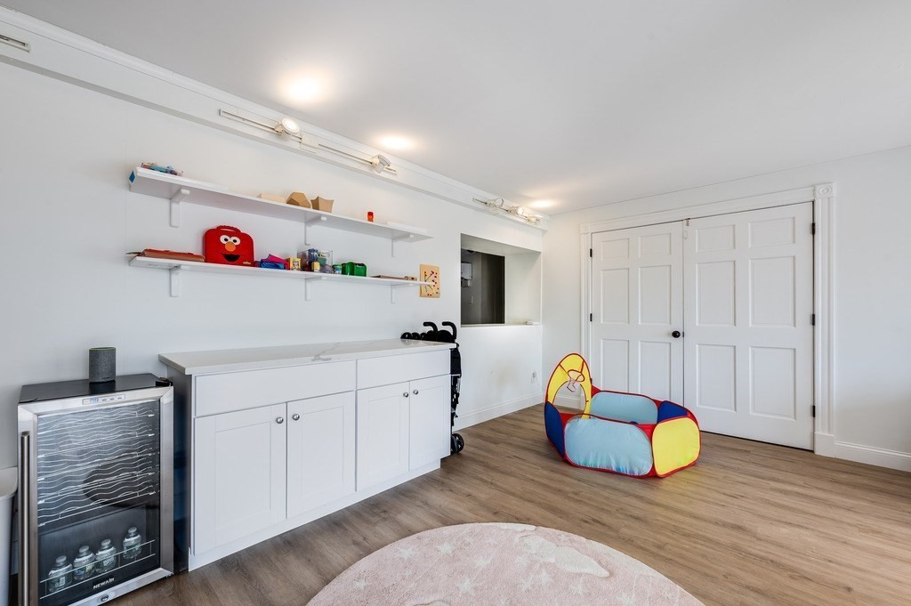 21 Arborough Road Boston, MA 02131 - Photo 31 of 40 a view of living room with furniture and wooden floor