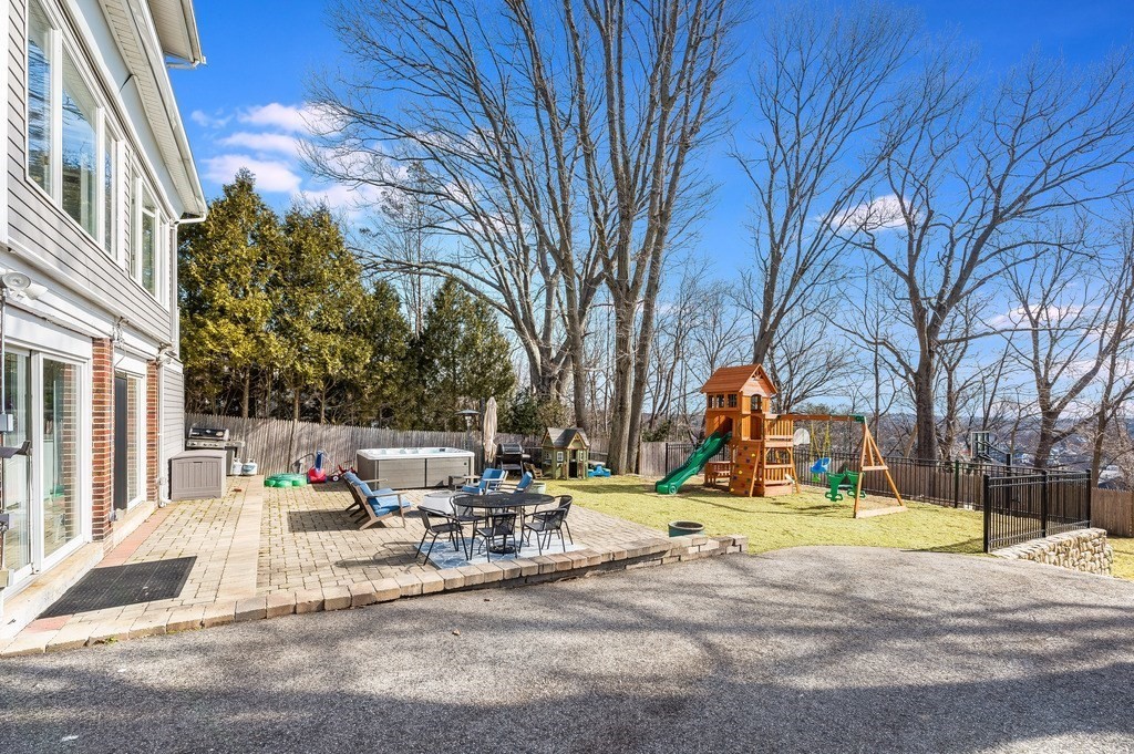 21 Arborough Road Boston, MA 02131 - Photo 33 of 40 a view of outdoor space with garden and trees