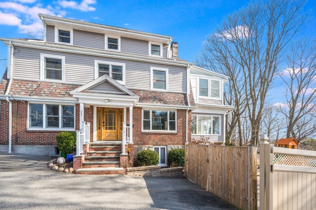 21 Arborough Road Boston, MA 02131 - Photo 39 of 40 a front view of a house with a yard